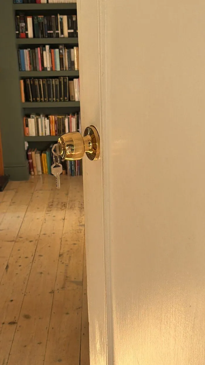 Like-for-like brass door knob after replacement, Witney