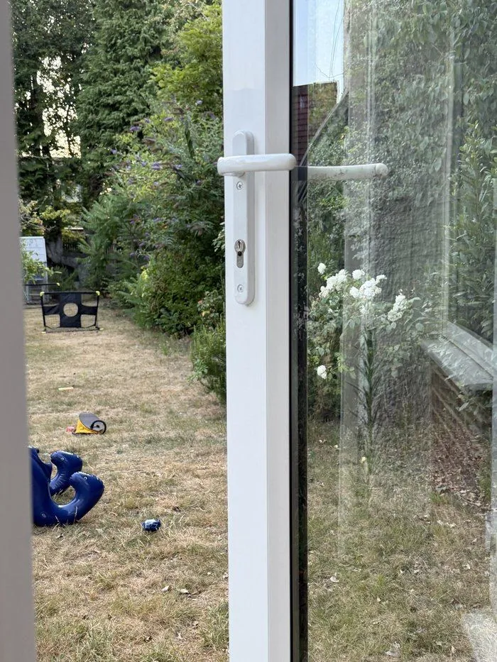 UPVC conservatory door opened onto the garden after a new lock was fitted, Charlbury