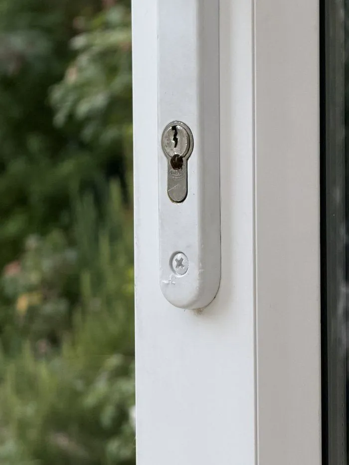Euro cylinder lock on a UPVC conservatory door before replacement, Charlbury