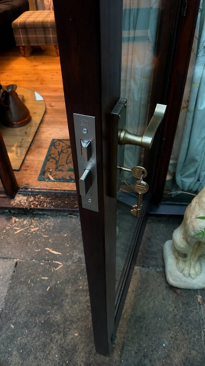 New satin lever handle and lock fitted to a glazed timber door in Woodstock