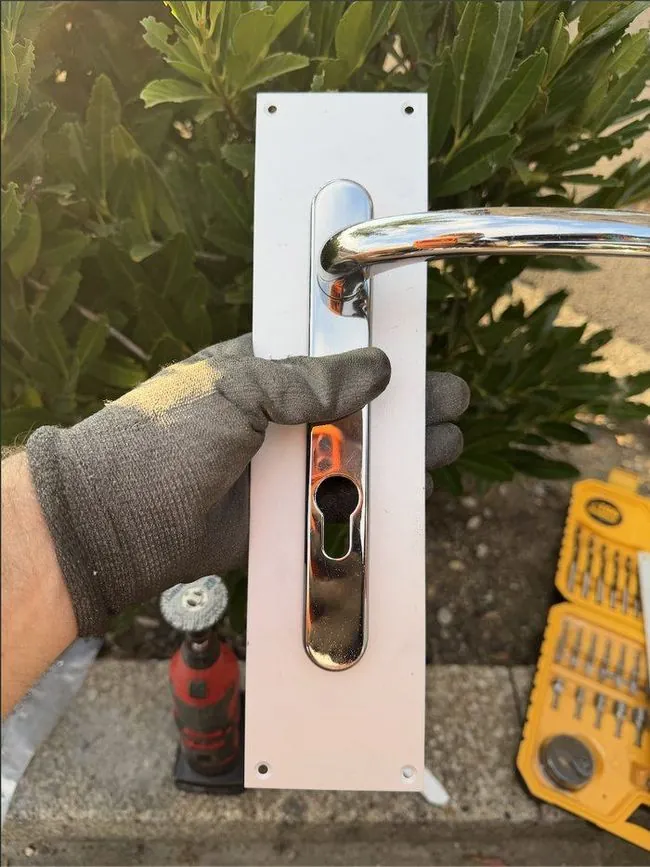 Multi-point door handle and euro cylinder fitted to a commercial door